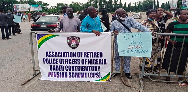 Police retirees protest at NASS gate